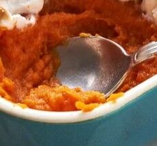 Game time! 👀 Can you guess which classic Thanksgiving side dish is hidden in the zoomed-in photo below? Hint: it’s creamy and often orange. Drop your guess in the comments!